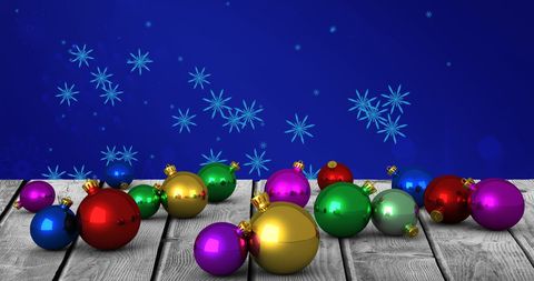 Festive Christmas Ornaments on Wooden Floor with Snowflake Background