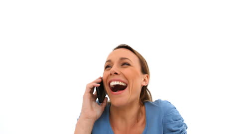 Cheerful Woman Laughing while on Phone Call