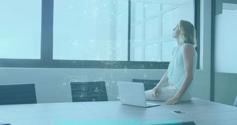 Businesswoman Analyzing Data on Her Laptop in Modern Office - Download Free Stock Images Pikwizard.com