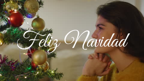 Joyful Caucasian Woman Enjoying Christmas by Decorated Tree