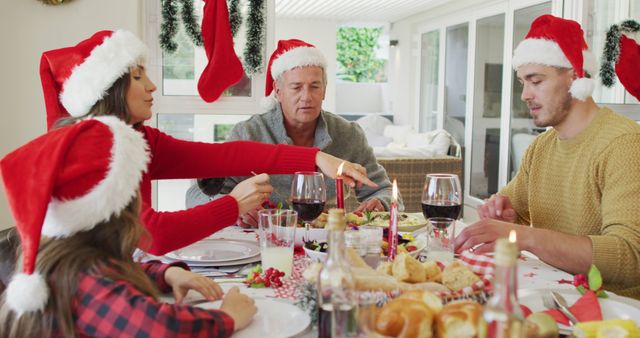 Multi-Generational Family Enjoying Christmas Dinner Together - Download Free Stock Images Pikwizard.com