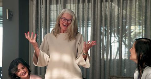 Senior Woman Leading Group Therapy Discussion with Diverse Patients