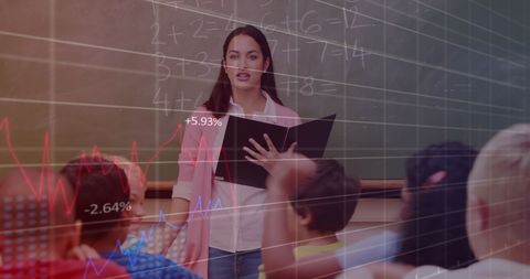 Teacher Presenting Math Lesson with Economic Graph Overlay in Classroom - Download Free Stock Images Pikwizard.com
