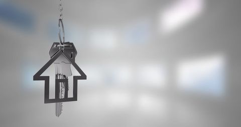 house-shaped keychain symbolizing real estate or home ownership - Download Free Stock Images Pikwizard.com
