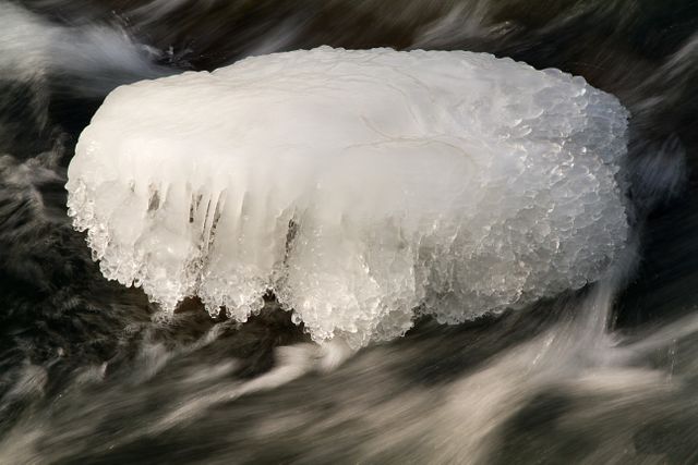 Ice Block in Flowing River during Winter - Download Free Stock Photos Pikwizard.com