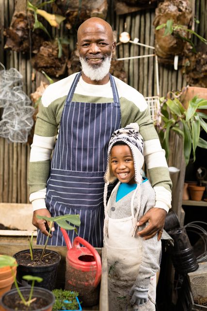 Happy Senior African American Man with Grandson in Garden - Download Free Stock Images Pikwizard.com