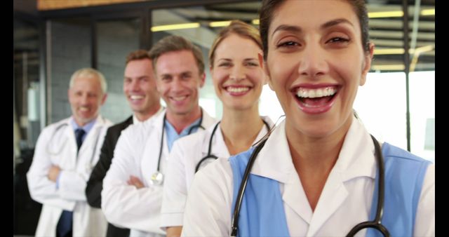 Happy Medical Team Smiling and Standing Together in Hospital - Download Free Stock Images Pikwizard.com