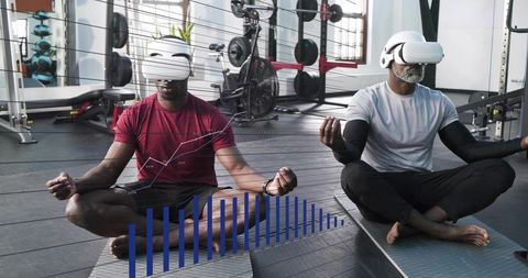 Two men practicing vr meditation in gym wearing headsets, combining fitness and data