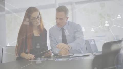 Business Professionals Collaborating on Digital Reports