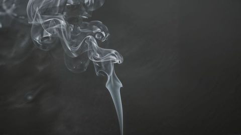 Ethereal Curling Smoke on Minimalist Dark Background