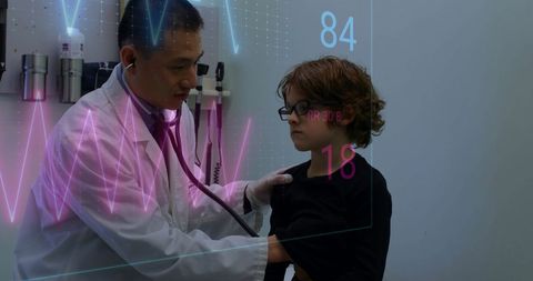 Doctor Using Digital Interface for Pediatric Heart Examination