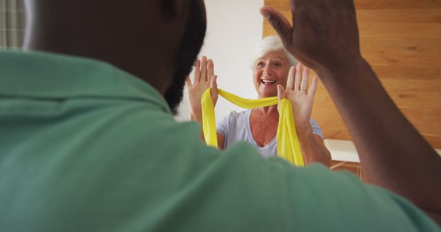 Senior Woman Enjoying Physical Therapy with Resistance Band Exercise - Download Free Stock Images Pikwizard.com