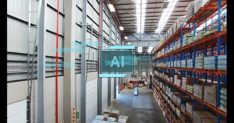 AI-assisted warehouse inventory management showing pallet racking and high-bay shelving