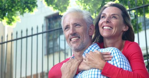 Happy Mature Couple Enjoying Outdoor Embrace on Sunny Day - Download Free Stock Images Pikwizard.com