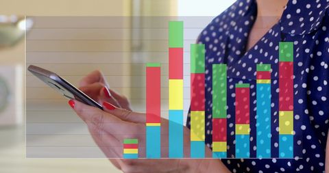 Person Analyzing Data Through Smartphone with Overlayed Charts
