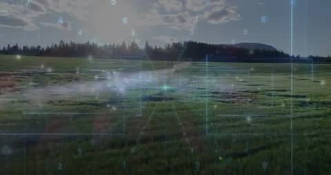 Grassland Field with Futuristic HUD Overlay at Sunrise