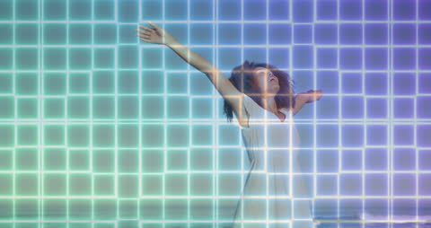 Joyful Woman on Beach Surrounded by Digital Grid Design