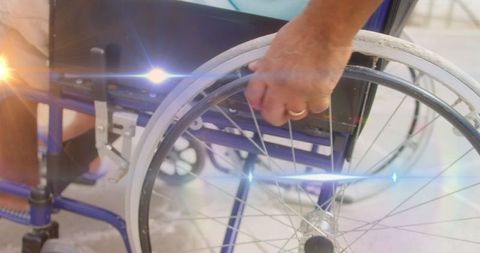 Disabled person moving wheelchair independence outdoors