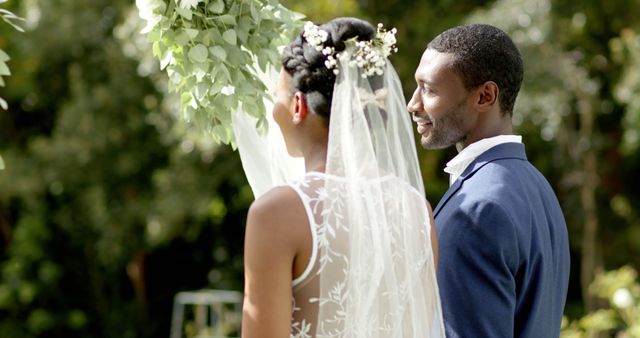 Joyful Bride and Groom Celebrating in Sunlit Garden - Download Free Stock Images Pikwizard.com