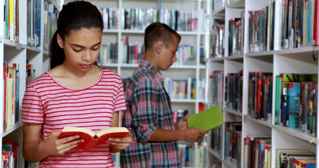 Teenage Students Reading Books in Library - Download Free Stock Images Pikwizard.com