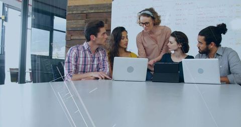 Young Professionals Collaborating in Creative Team Meeting