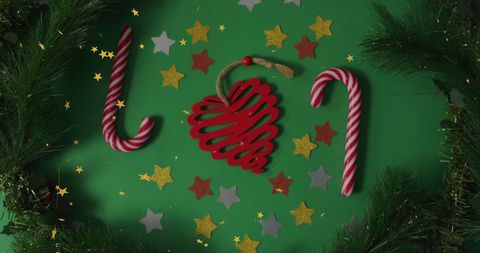 Christmas decorations on festive green background