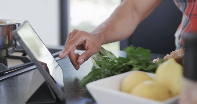 Person Using Tablet for Cooking Recipes in Modern Kitchen - Download Free Stock Images Pikwizard.com