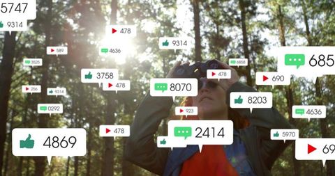 Woman using binoculars in sunlit forest surrounded by social media notification bubbles