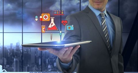 Businessman presenting healthcare innovations with digital interface