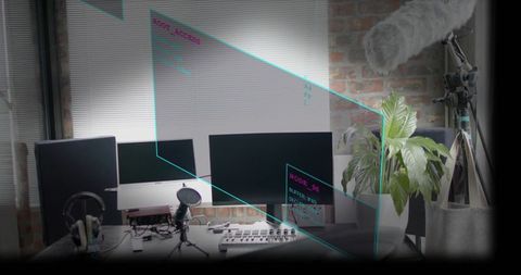 Compact streaming workstation with condenser mic, triple monitors and ar overlays