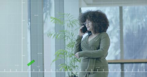 Confident Businesswoman Analyzing Financial Data Office