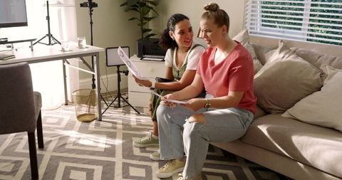 Collaborative brainstorming at home office with printed charts