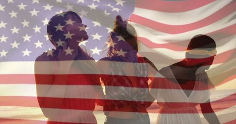 Friends celebrating unity at beach with american flag overlay