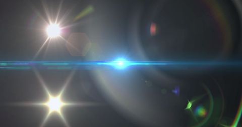 Dynamic Light Spots on Black Background