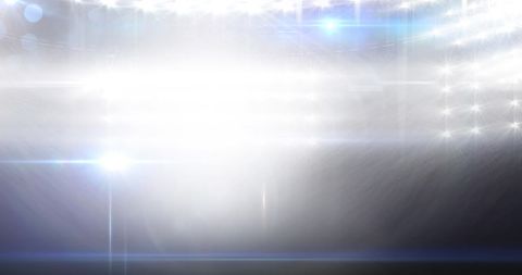 Bright stadium lights blurring abstract motion