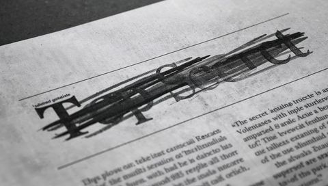 Blackout headline with heavy marker over serif drop cap on textured newsprint