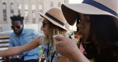 Young Friends Celebrating on Urban Rooftop Party
