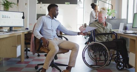 Inclusive work environment with diverse team collaborating