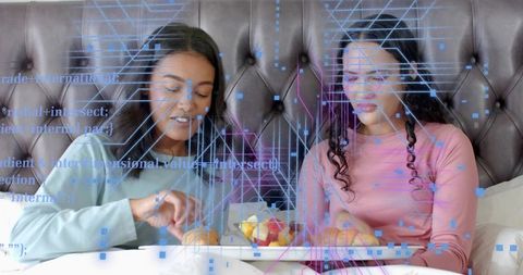 Sharing breakfast in bed with digital overlay, two women wearing pastel tops, cozy morning