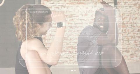 Couple doing core workout with smartwatches in urban studio with digital analytics overlay