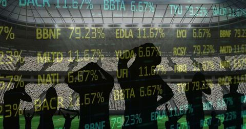Fan Silhouettes and Stock Market Numbers Overlapping Sports Arena