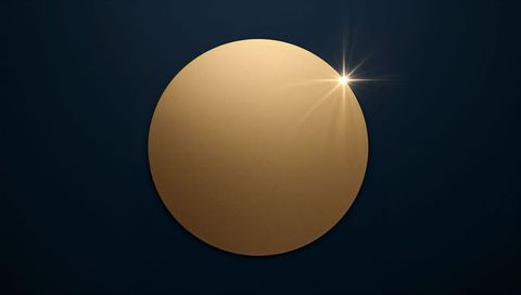 Matte Gold Textured Circular Disc with Starburst Flare on Deep Navy Minimalist Backdrop