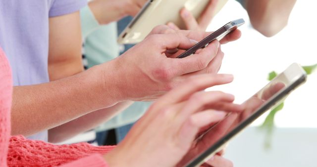 Hands Holding Smartphones and Tablets in Group Setting - Download Free Stock Images Pikwizard.com