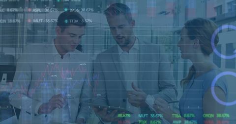 business team analyzing financial metrics with digital overlay - Download Free Stock Images Pikwizard.com