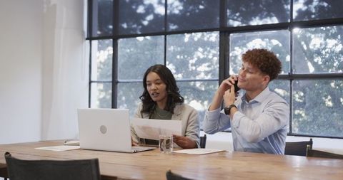 Business Team Collaborating on Projects in Modern Office
