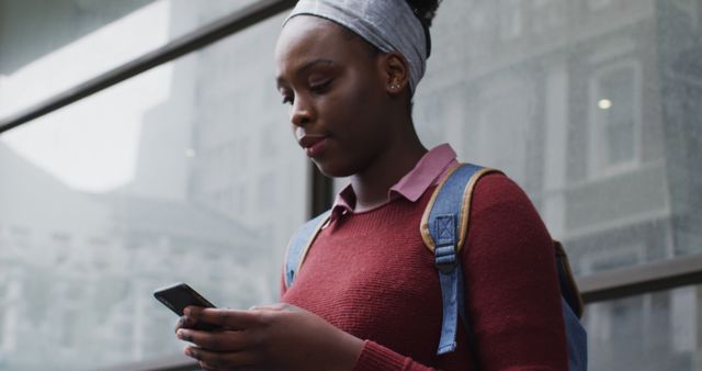 Focused African American Student Using Smartphone Outdoors Industrial Campus Setting - Download Free Stock Images Pikwizard.com