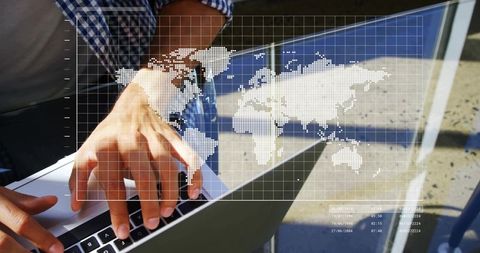 Typing on laptop with digital world map overlay for global data visualization