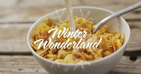 Rustic cornflakes breakfast with milk splash and winter wonderland typography overlay