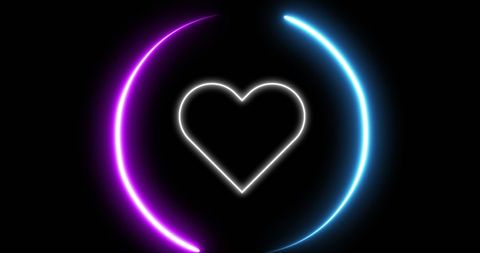 Neon glowing heart icon with vibrant light trails