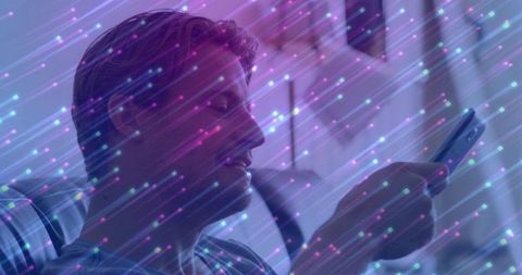 Man Relaxing at Home with Smartphone Amidst Futuristic Digital Streaks